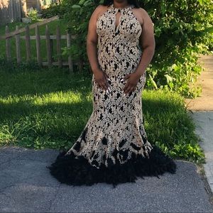 Black and gold lace prom dress with feathers